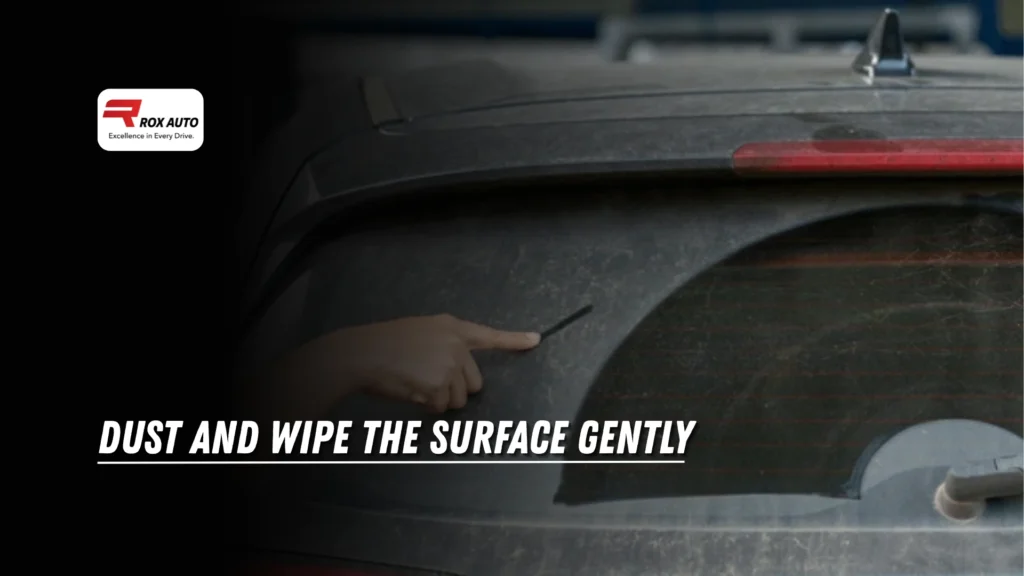 Dust and Wipe the Car Window Surface Gently