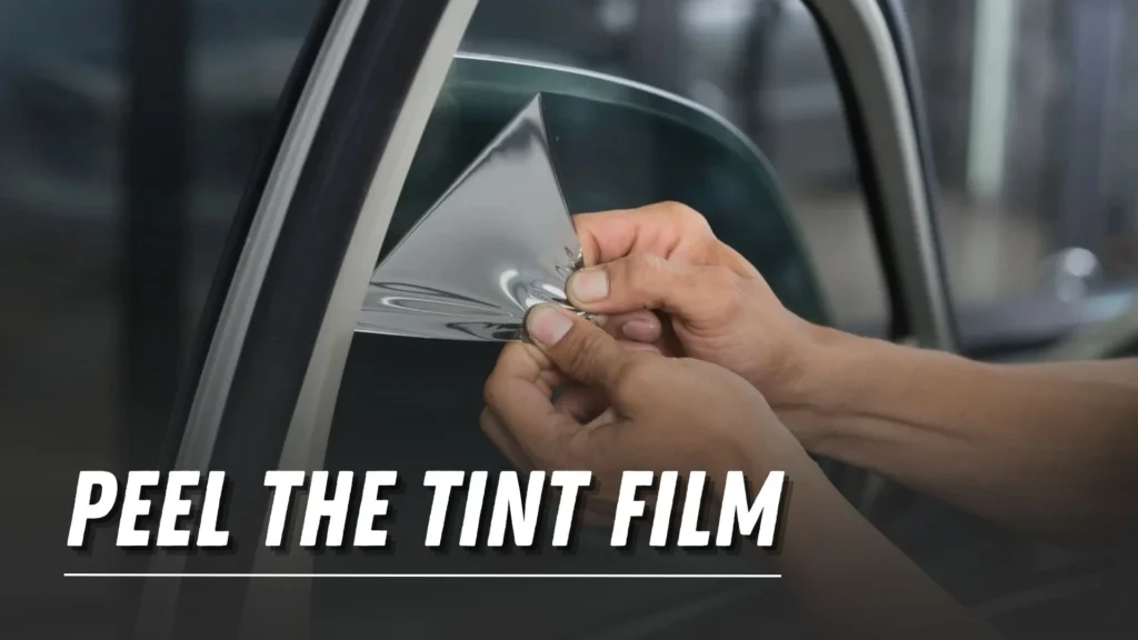 Peel the tint film from car window
